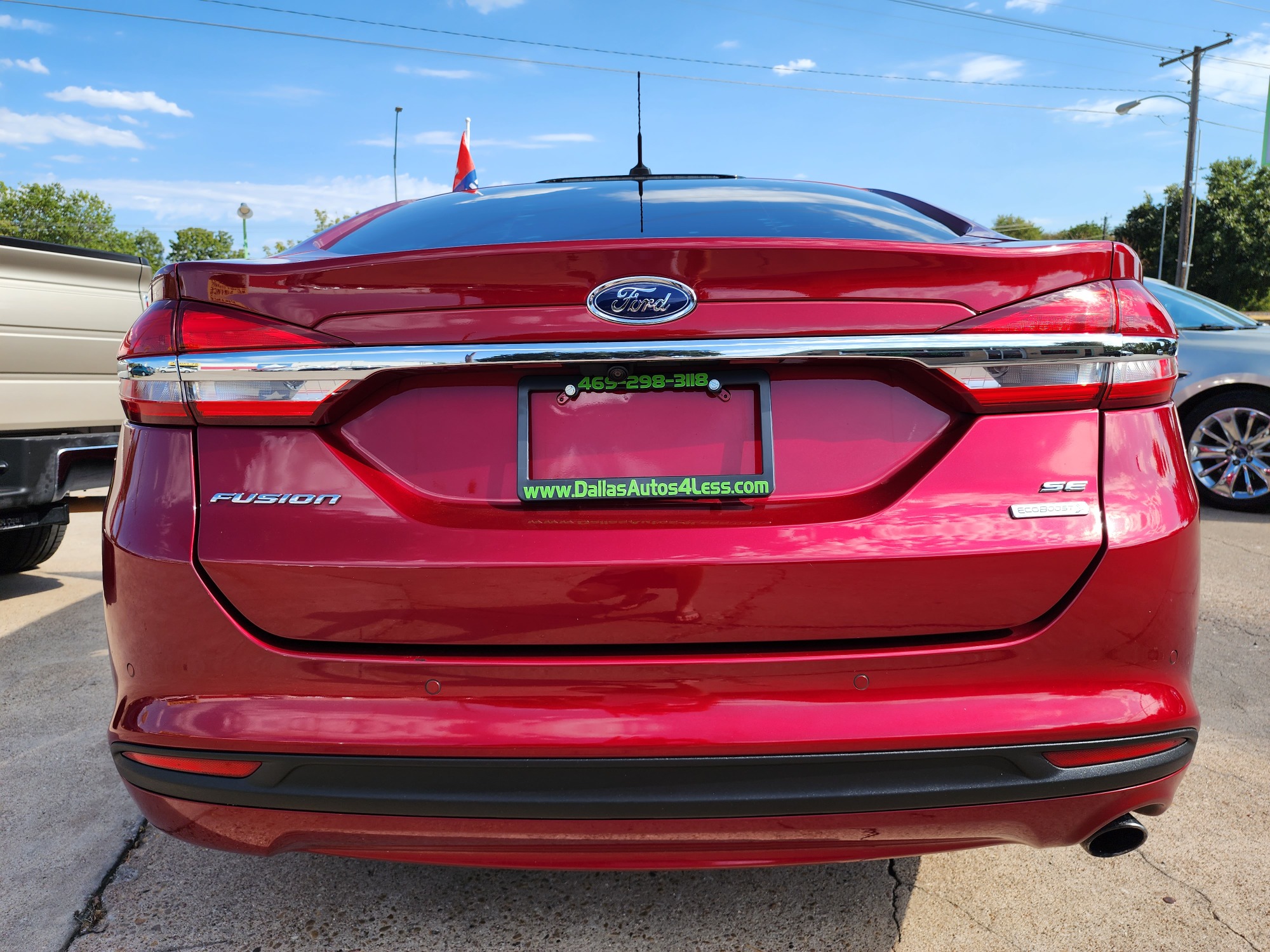 2018 RED Ford Fusion SE (3FA6P0HD2JR) with an 1.5L L4 DOHC 16V engine, 6A transmission, located at 2660 S.Garland Avenue, Garland, TX, 75041, (469) 298-3118, 32.885551, -96.655602 - Welcome to DallasAutos4Less, one of the Premier BUY HERE PAY HERE Dealers in the North Dallas Area. We specialize in financing to people with NO CREDIT or BAD CREDIT. We need proof of income, proof of residence, and a ID. Come buy your new car from us today!! This is a 2019 FORD FUSION SE SEDAN! - Photo #4